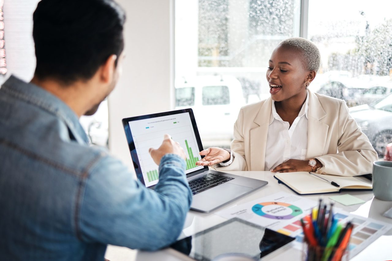 People reviewing workplace assessment information together